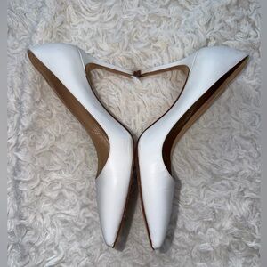 Manolo Blahnik white pumps
